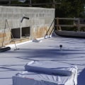 The Lifespan of a Flat Roof: How Often Should It Be Replaced?